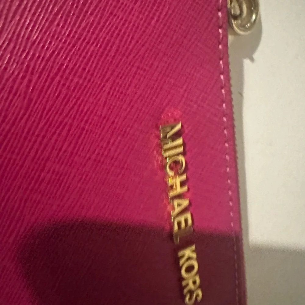 Michael Kors Fuchsia Wristlet with Gold Hardware